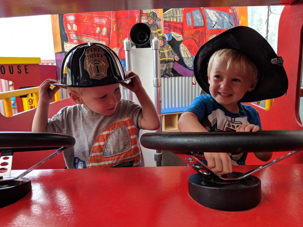 twins in play fire truck