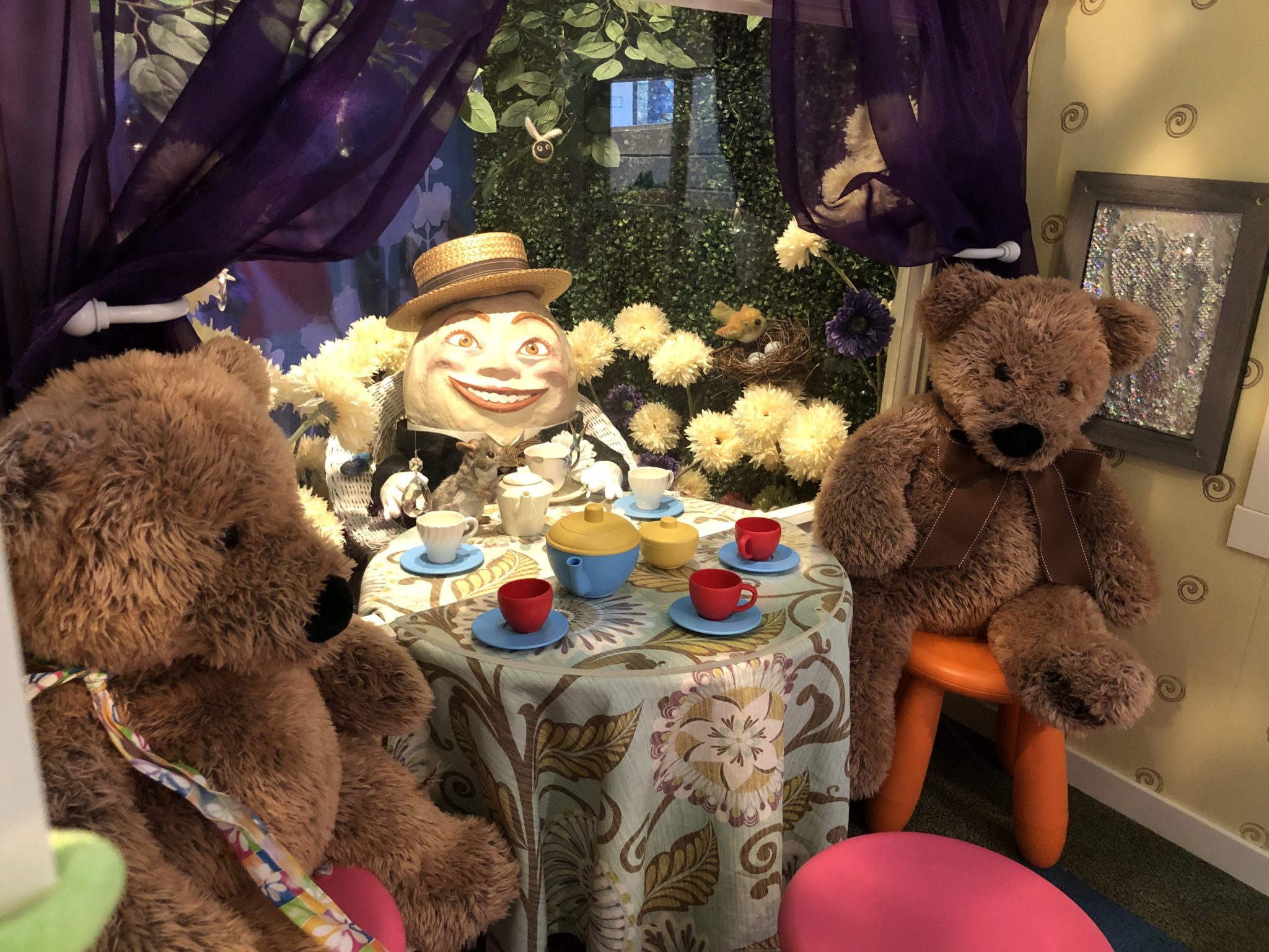 teddy bears in the storybook play cottage