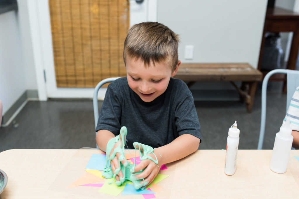 child playing with slime