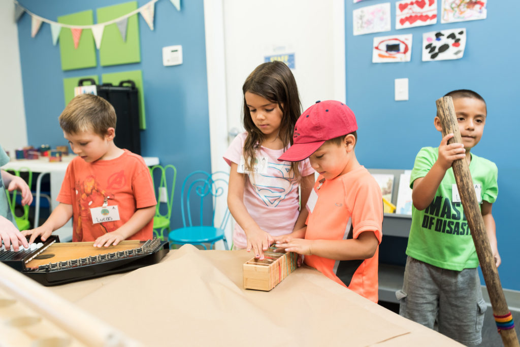 children playing indoors at wonder camp