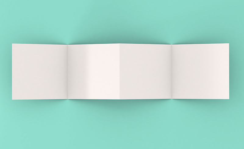 paper folded into an Accordion Book on teal background