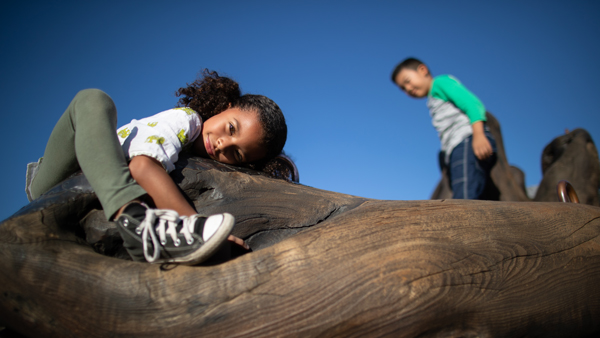 Children playing on megaflora exhibit