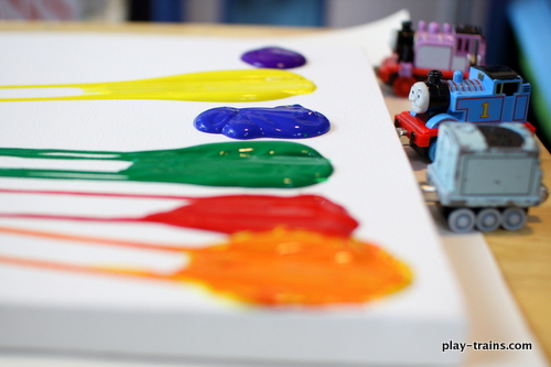 paint drops with toy trains