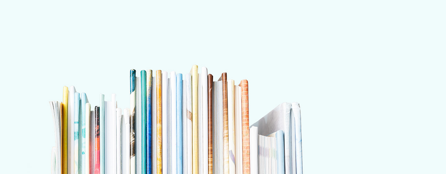 Close view of Stack of children's books on a bookshelf