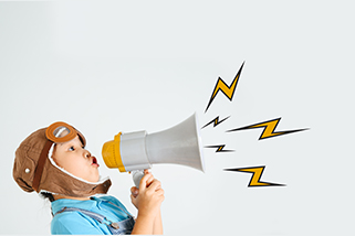 child with a megaphone raising awareness about local issues