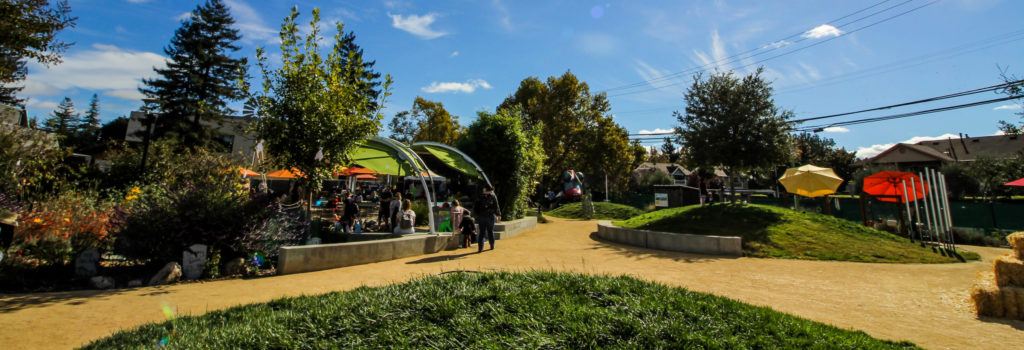 Wide view of the outdoor exhibit area called Mary's Garden at the Children's Museum of Sonoma County.