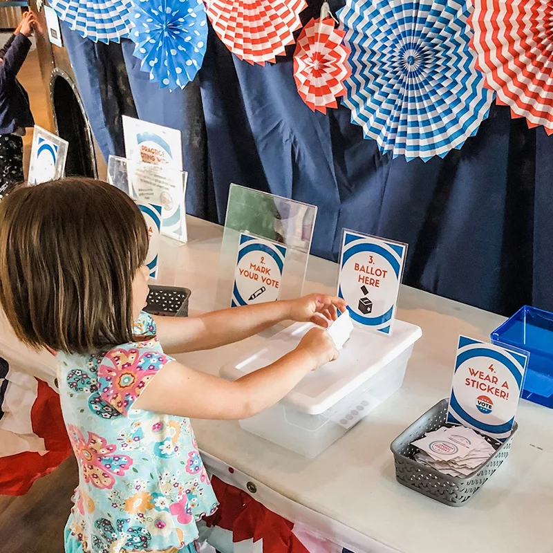 A child filling out a mock election ballot at the Children's Museum of Sonoma County