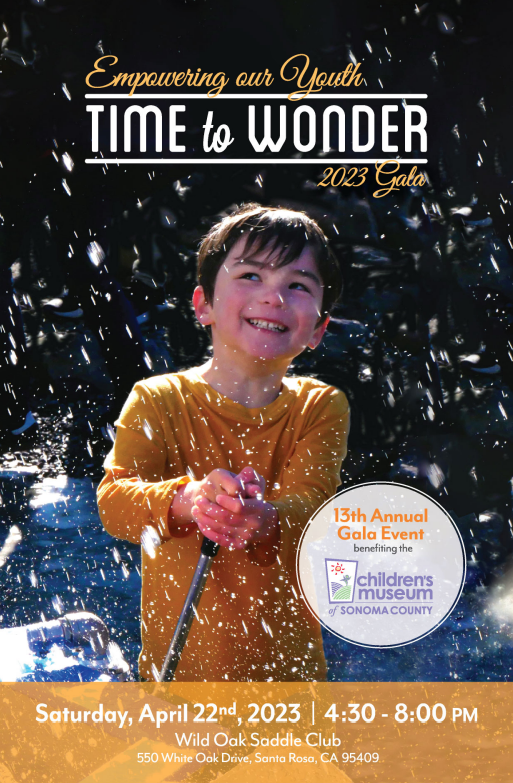 children playing with outdoor water exhibit at the Children's Museum
