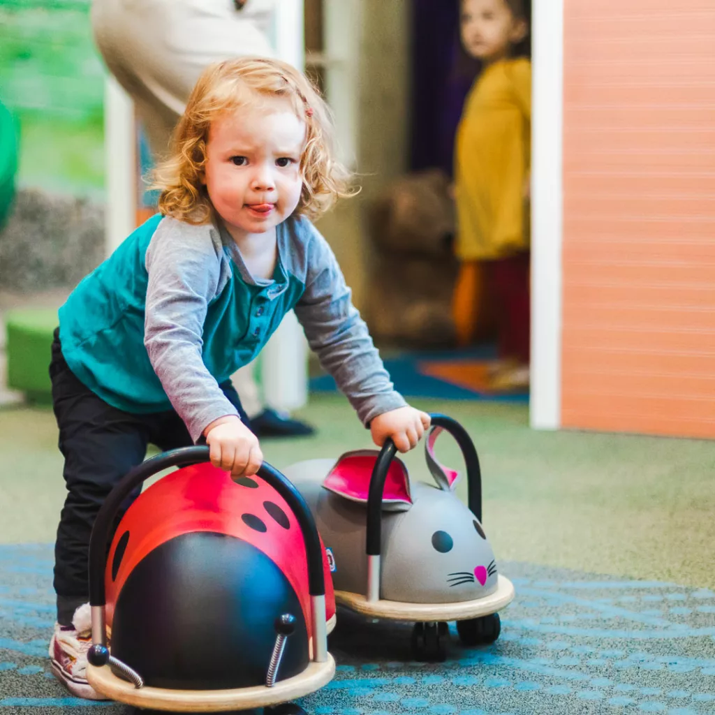 little girl playing at the children's museum