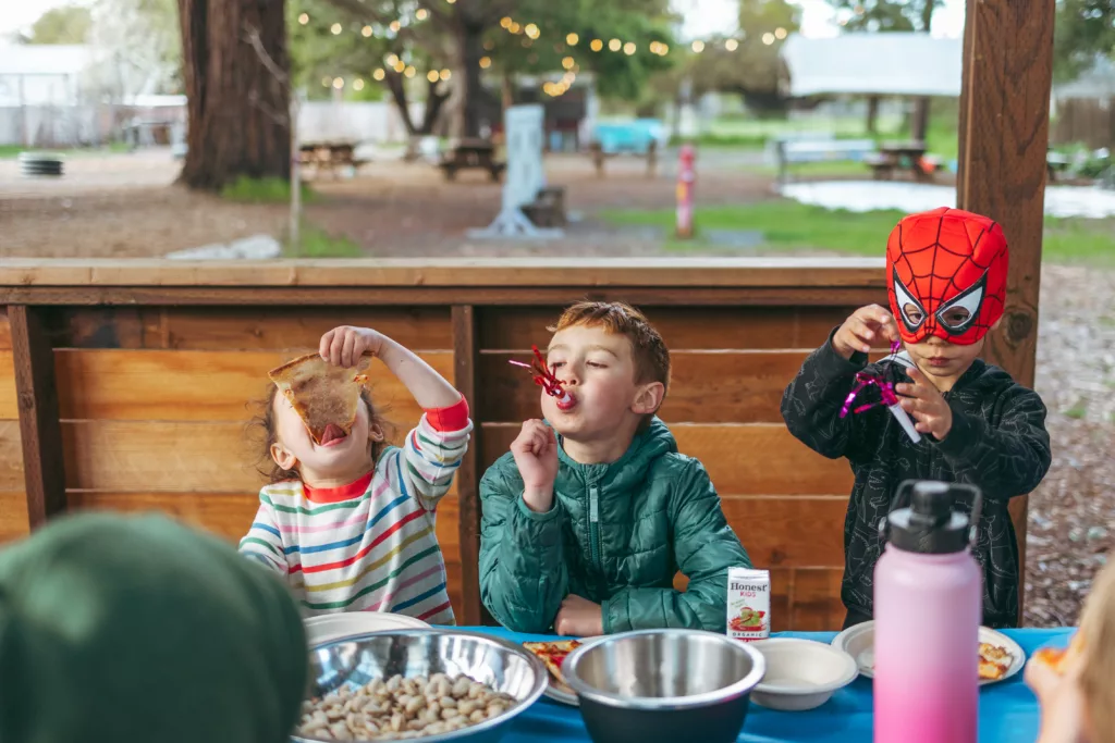 children playing together at the Party Pavilion which is decorated for a recent birthday party
